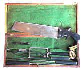 amputation set, Still, saw moved.jpg (93081 bytes)