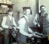 photo, amputation scene with three doctors, c. 1890s, trim.jpg (305065 bytes)