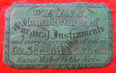 http://antiquescientifica.com/urology_Weiss_lithotrite_set_case_c._1835_paper_label.jpg